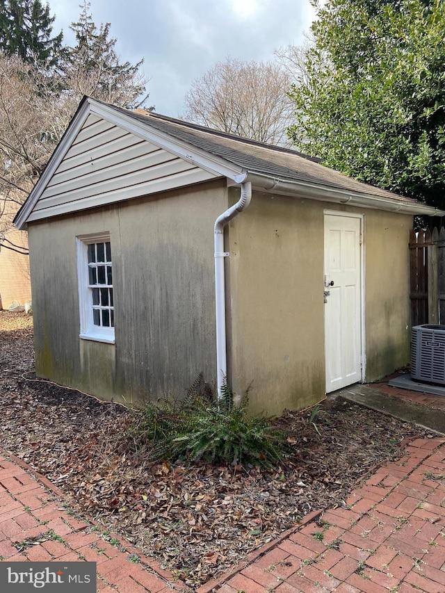 view of side of property with cooling unit