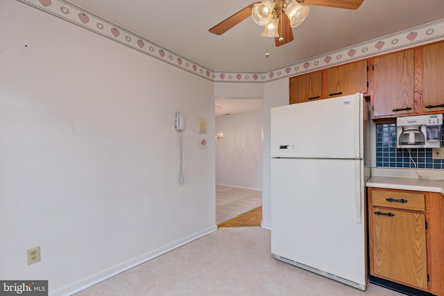 kitchen featuring white refrigerator and ceiling fan