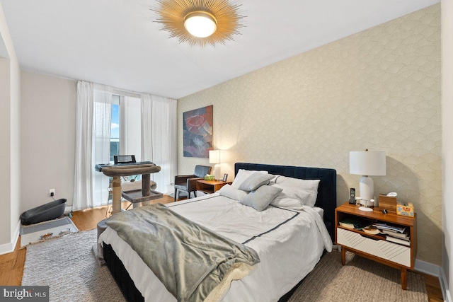 bedroom featuring hardwood / wood-style flooring