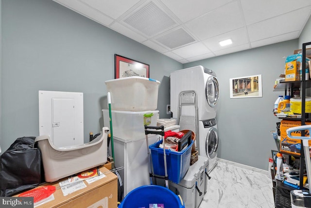 washroom with stacked washer / dryer