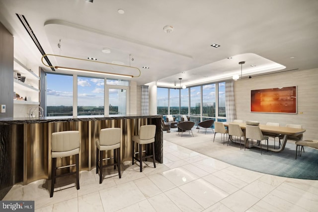 building lobby featuring a water view