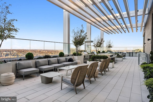 view of patio with an outdoor hangout area and a pergola