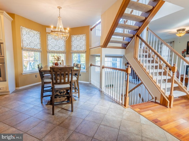 dining space featuring a chandelier