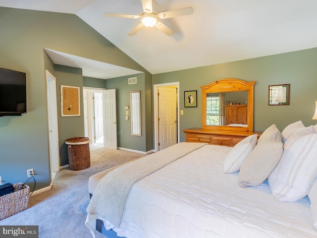 carpeted bedroom featuring vaulted ceiling and ceiling fan