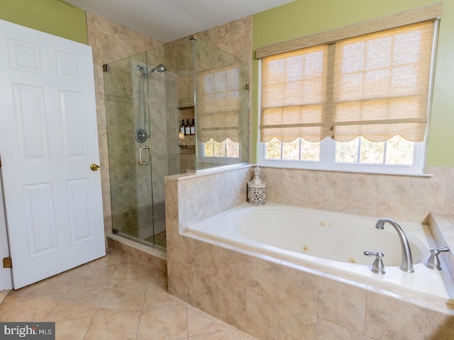 bathroom featuring independent shower and bath and tile patterned floors