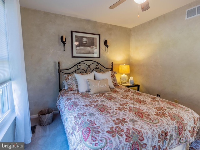 bedroom featuring ceiling fan and carpet floors