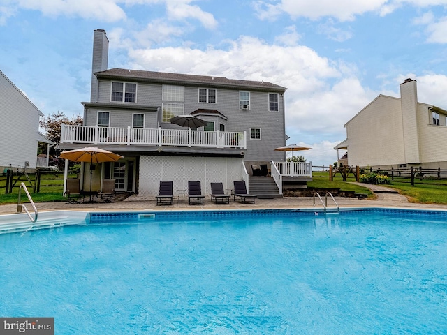 view of pool featuring a deck