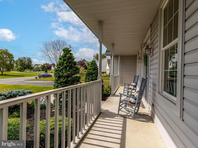 balcony featuring a porch