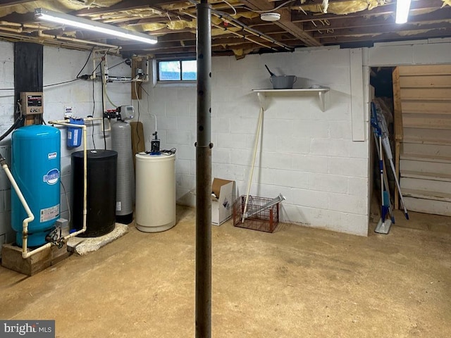 basement featuring concrete block wall