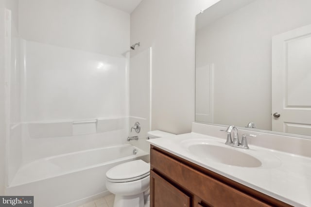 full bathroom featuring tile patterned floors, vanity, toilet, and bathing tub / shower combination