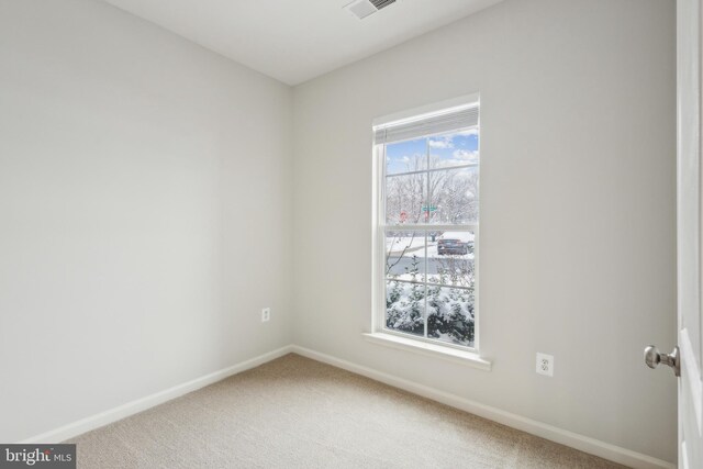 view of carpeted spare room