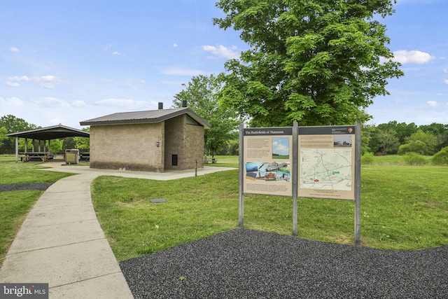 view of community featuring a lawn