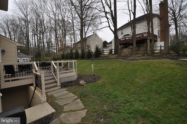 view of yard with a wooden deck