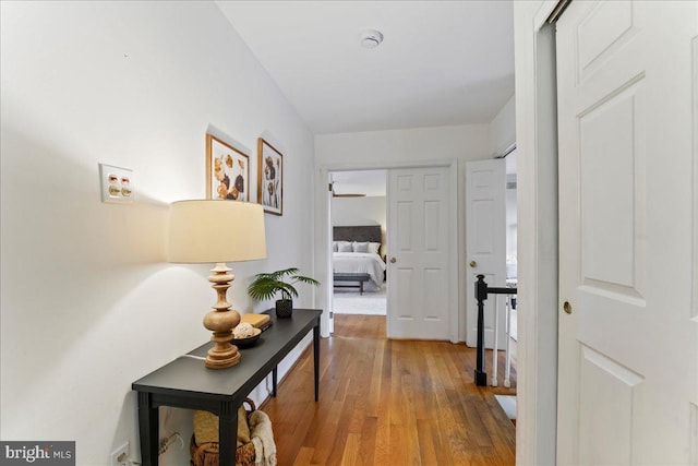 hall featuring wood finished floors