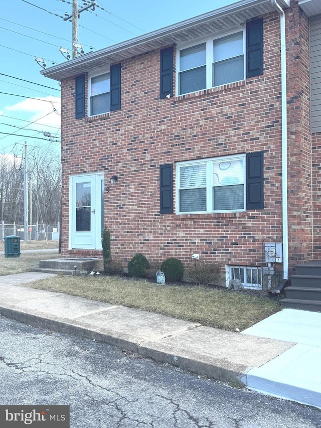 view of front of property with central AC unit