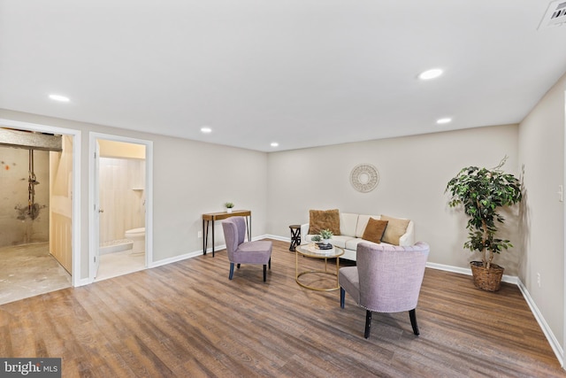 living area featuring dark hardwood / wood-style flooring