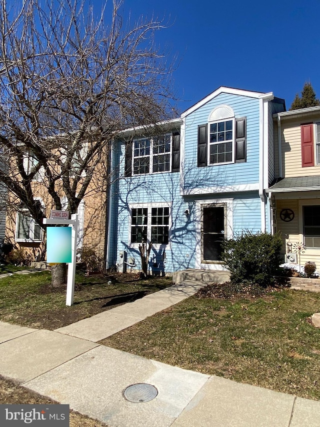 view of front of home with a front yard