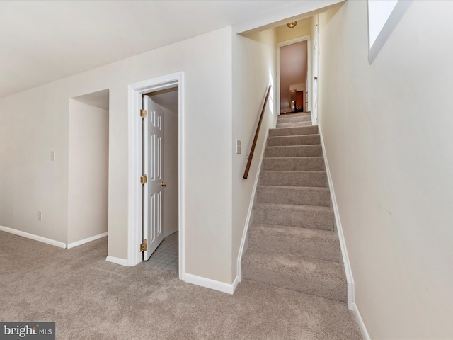 stairway with carpet floors