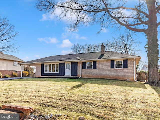 single story home with a front yard