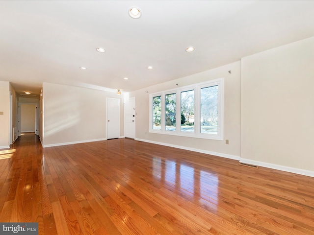 empty room featuring hardwood / wood-style floors