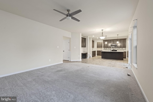 23348 Lindsay Dr, Leonardtown, MD 20650 - unfurnished living room featuring recessed lighting, light colored carpet, baseboards, and a ceiling fan