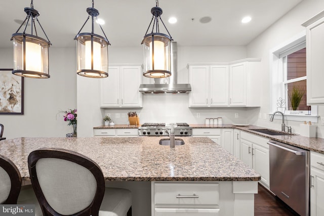 kitchen with stainless steel dishwasher, extractor fan, a sink, and white cabinetry