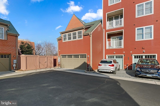 view of home's exterior with driveway and an attached garage