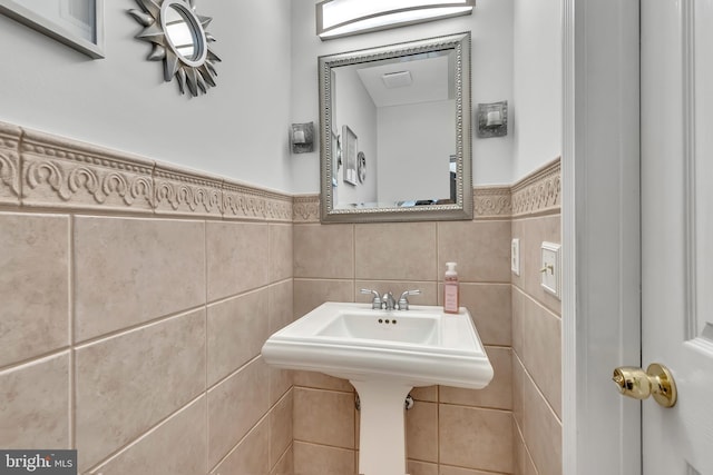 bathroom featuring a wainscoted wall