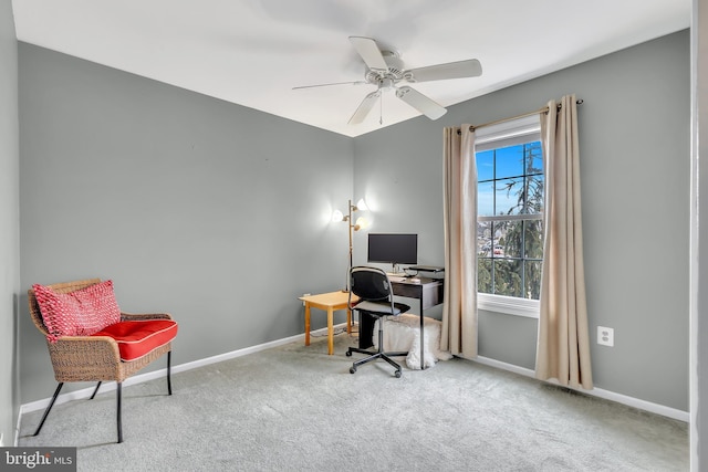 office area featuring carpet flooring, ceiling fan, and baseboards