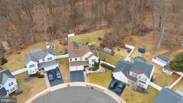 birds eye view of property with a residential view