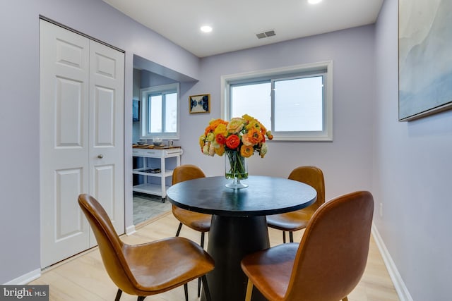 dining room featuring light hardwood / wood-style floors