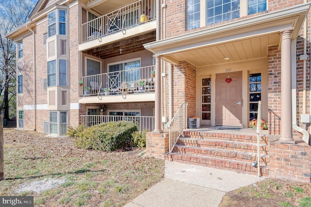 property entrance featuring central AC