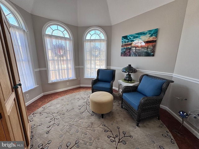 sitting room featuring baseboards