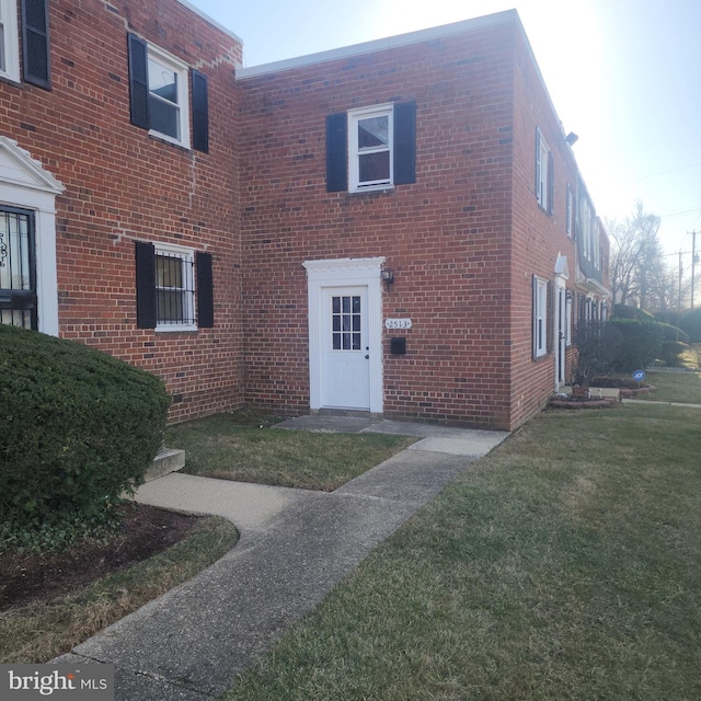 exterior space with a front lawn