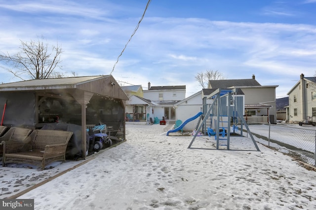 view of snow covered playground