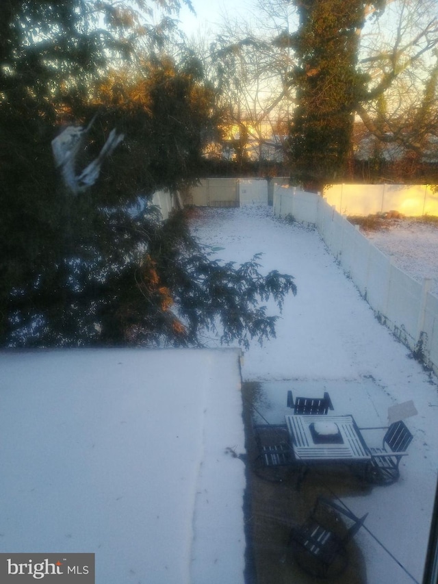 view of yard at dusk