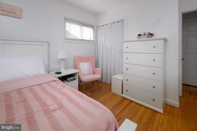 bedroom featuring hardwood / wood-style floors