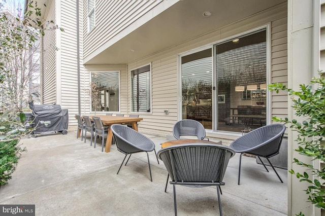 view of patio featuring a grill