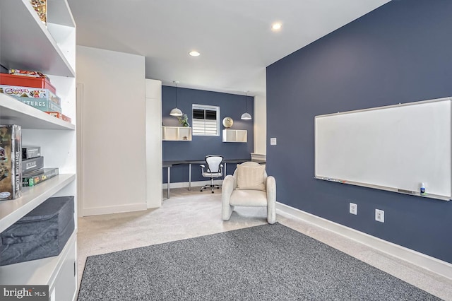 sitting room featuring carpet flooring