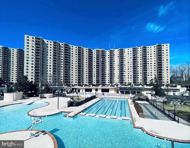 view of pool featuring a patio area