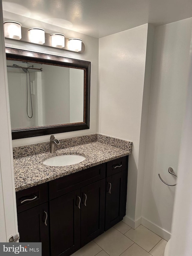 bathroom with vanity and tile patterned floors