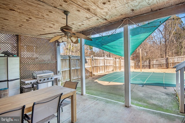 exterior space featuring wooden ceiling and ceiling fan