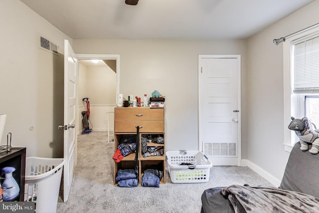 bedroom with light colored carpet