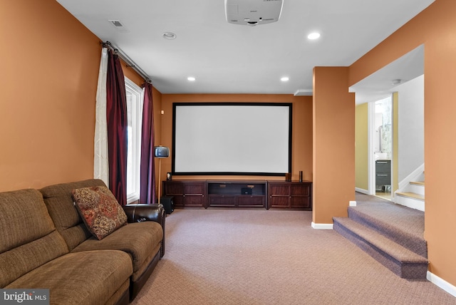 carpeted home theater room featuring recessed lighting and baseboards