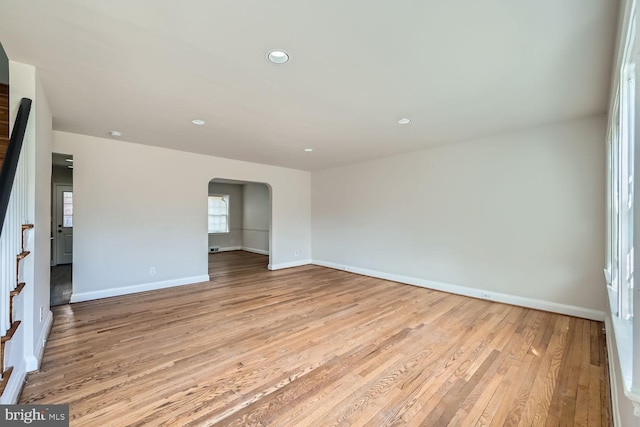 spare room with light hardwood / wood-style flooring