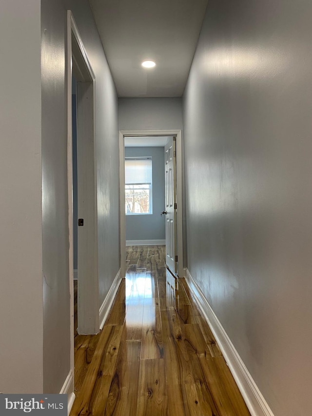 corridor featuring hardwood / wood-style flooring