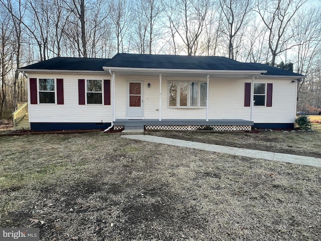 single story home featuring crawl space and a porch