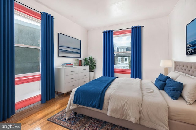 bedroom with light wood-type flooring