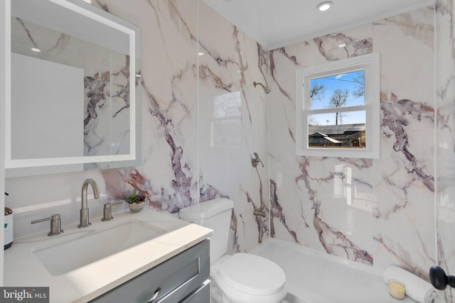 full bathroom featuring a stall shower, vanity, and toilet