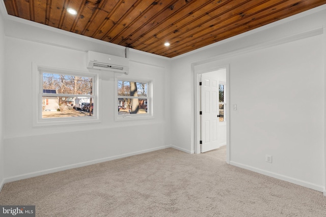 unfurnished room with recessed lighting, wood ceiling, light carpet, a wall mounted air conditioner, and baseboards